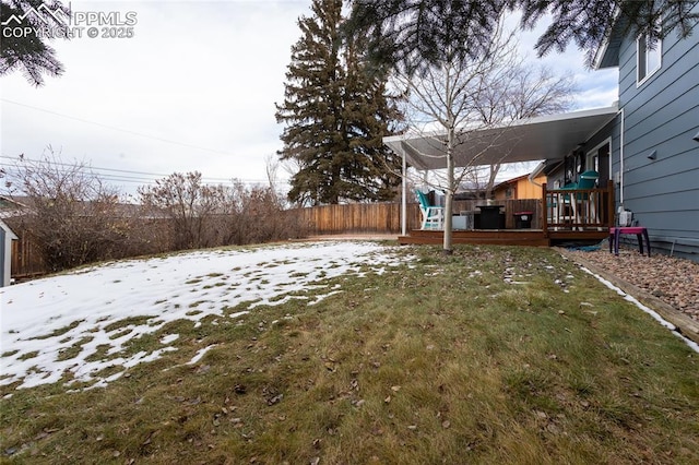 view of yard with a wooden deck