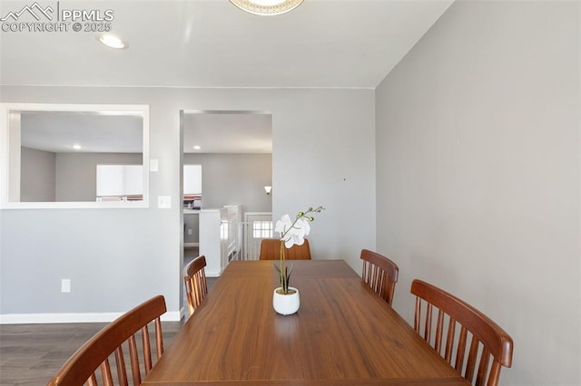 dining area featuring hardwood / wood-style flooring