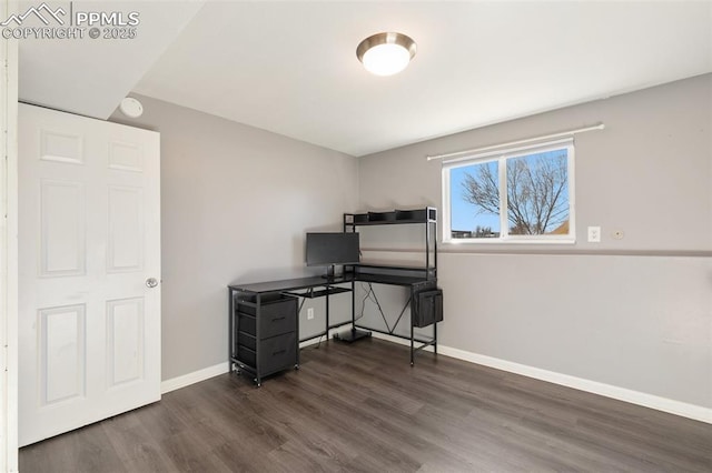 bedroom with dark wood-type flooring