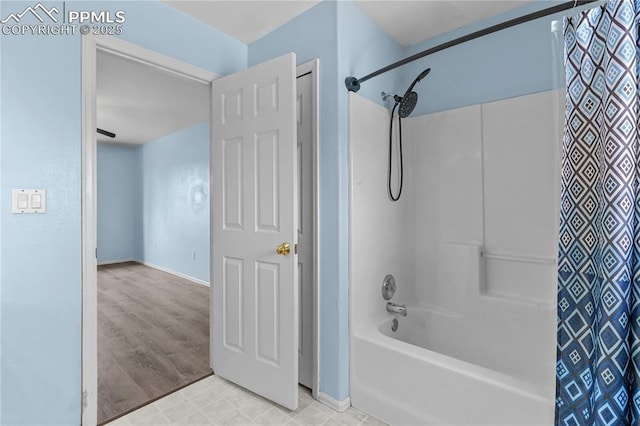 bathroom featuring shower / bath combo