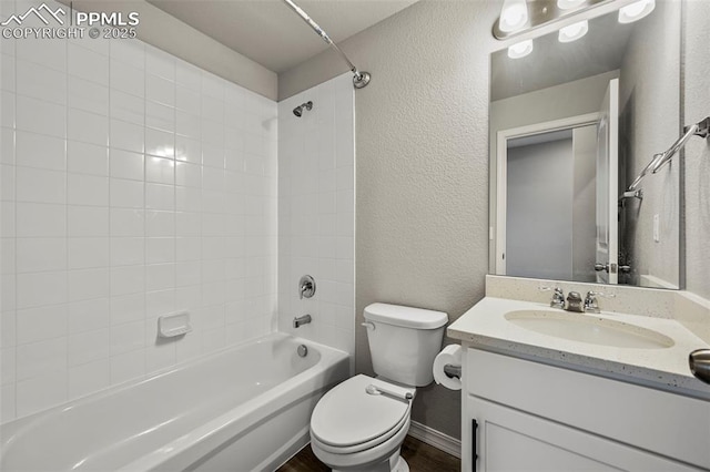 full bathroom with vanity,  shower combination, and toilet