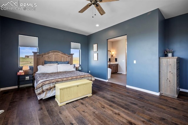 bedroom featuring connected bathroom, ceiling fan, dark wood-type flooring, and multiple windows