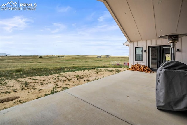 view of patio / terrace featuring a rural view