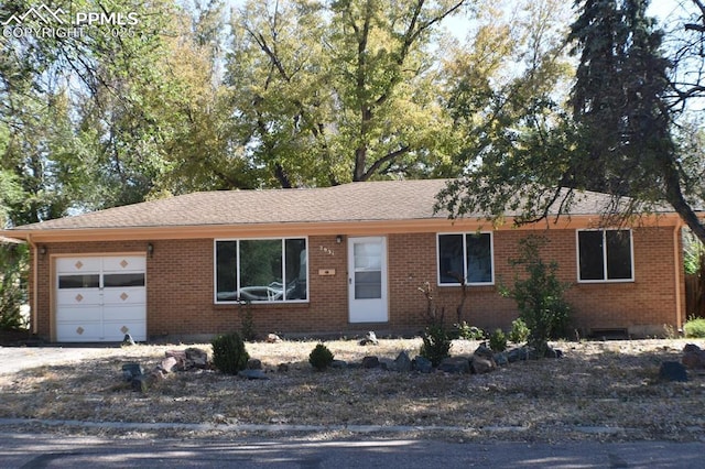 ranch-style house with a garage