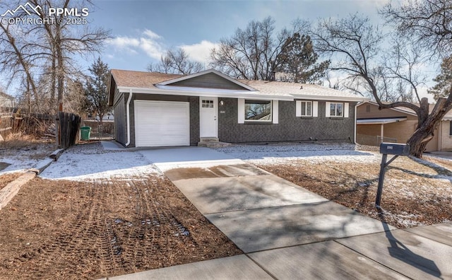 single story home featuring a garage