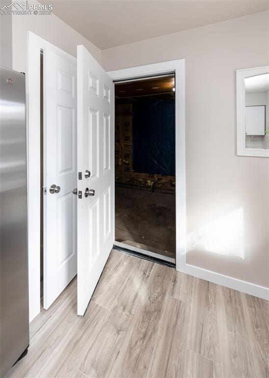 interior space with light hardwood / wood-style floors