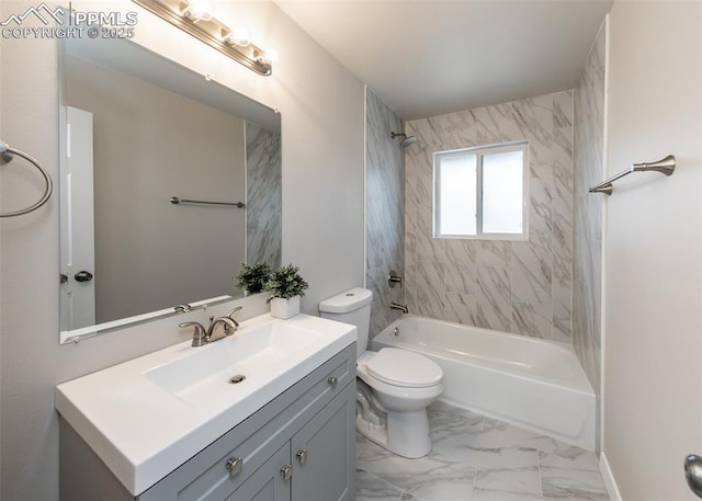 full bathroom featuring tiled shower / bath combo, toilet, and vanity