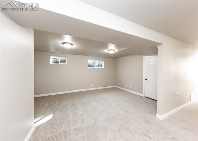 basement with light colored carpet