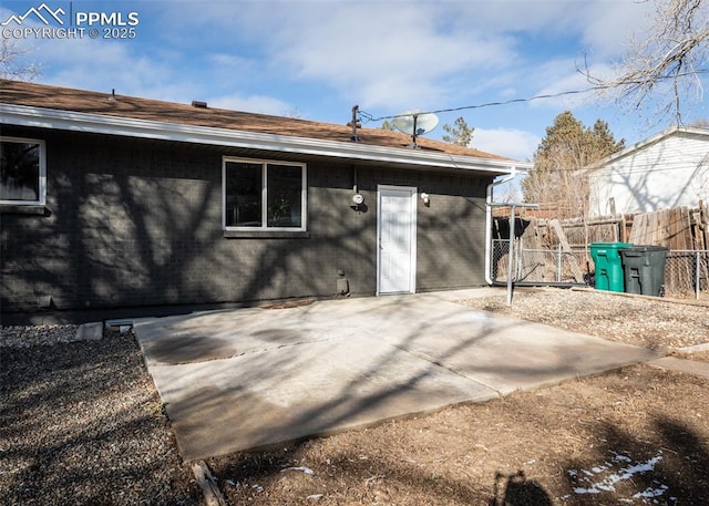 rear view of house featuring a patio area