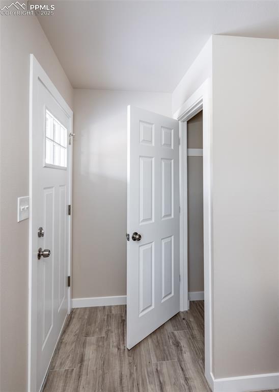 foyer with light hardwood / wood-style flooring