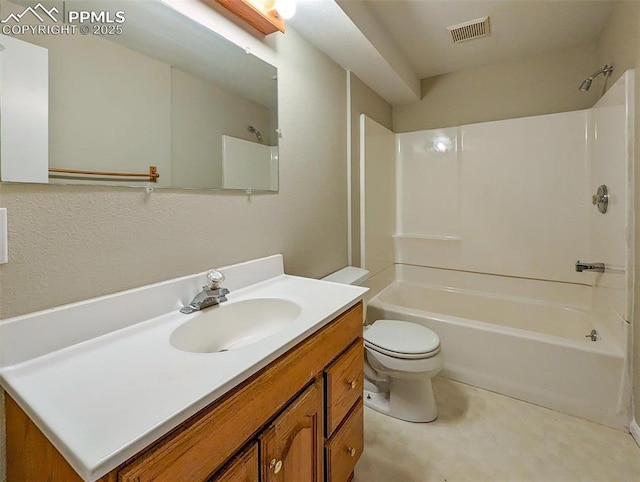 full bathroom featuring vanity, toilet, and shower / washtub combination