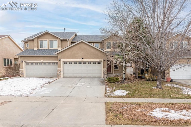 view of front of property featuring a garage