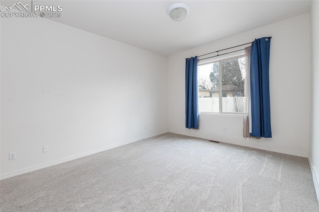 view of carpeted spare room