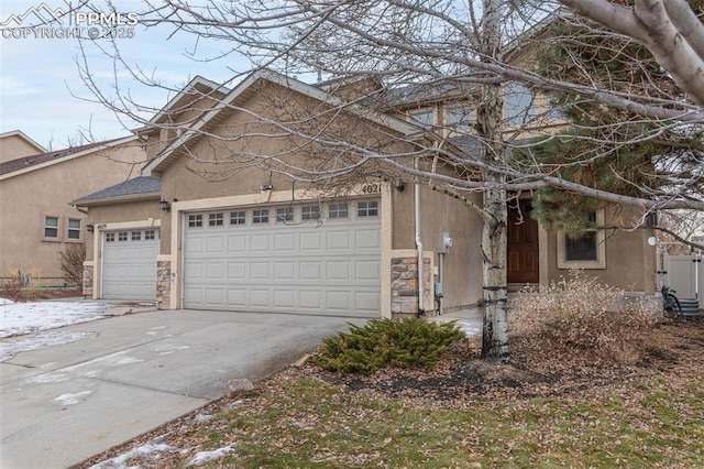 view of front of property with a garage