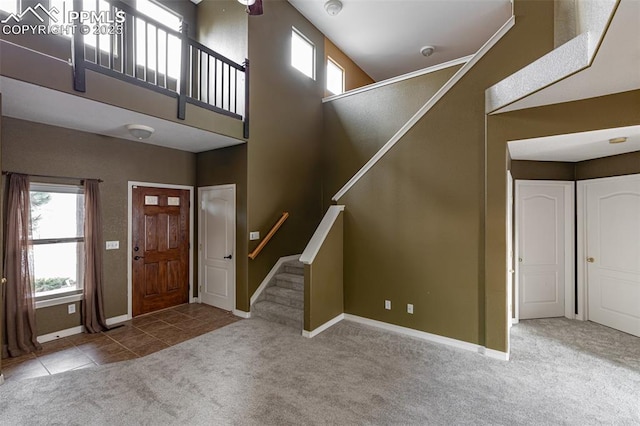 view of carpeted foyer