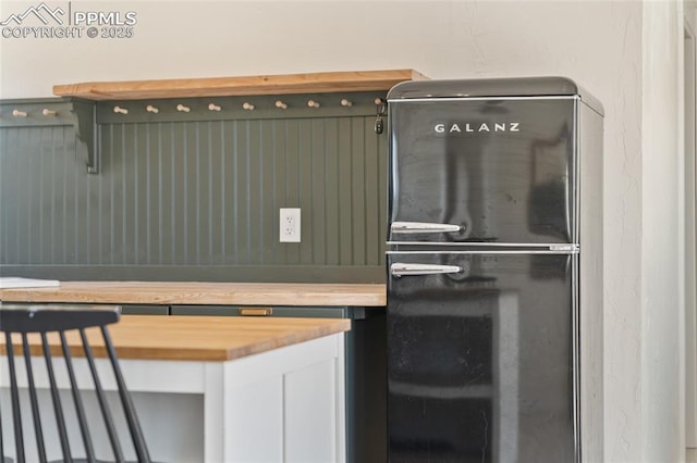 room details featuring refrigerator