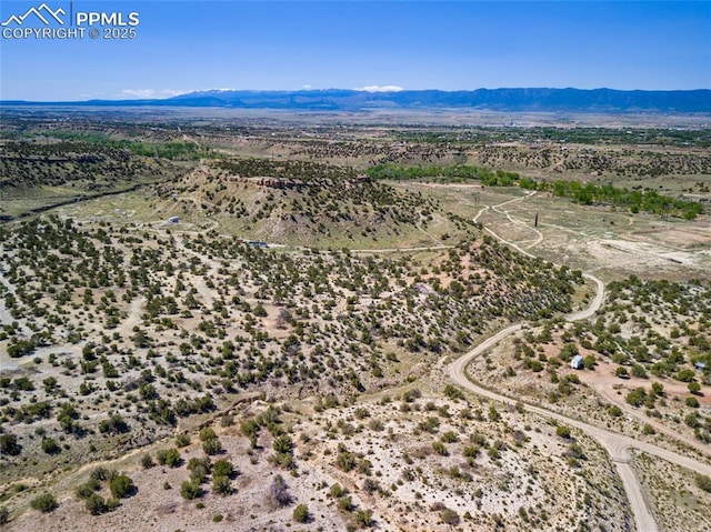 bird's eye view with a mountain view