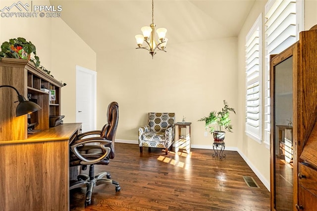 office area featuring dark wood-type flooring, an inviting chandelier, and vaulted ceiling