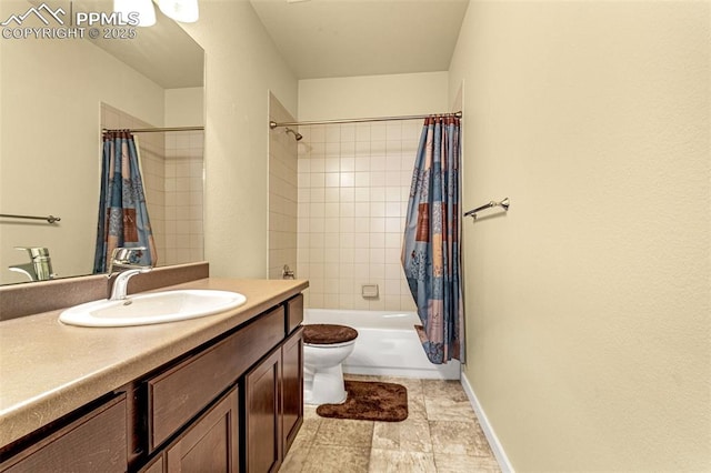 full bathroom with vanity, shower / tub combo, and toilet