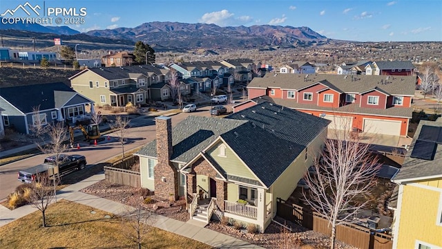 drone / aerial view featuring a mountain view