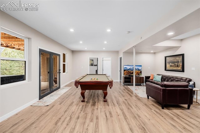 recreation room with light hardwood / wood-style floors, pool table, and french doors