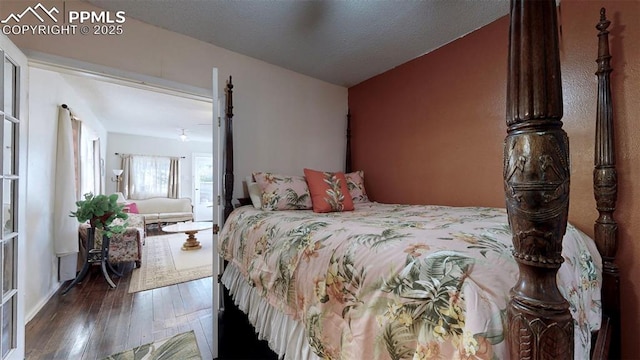 bedroom featuring dark hardwood / wood-style floors