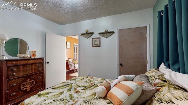 bedroom featuring a textured ceiling