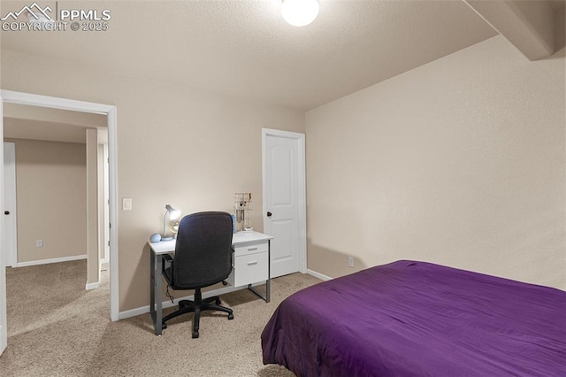 bedroom featuring light carpet