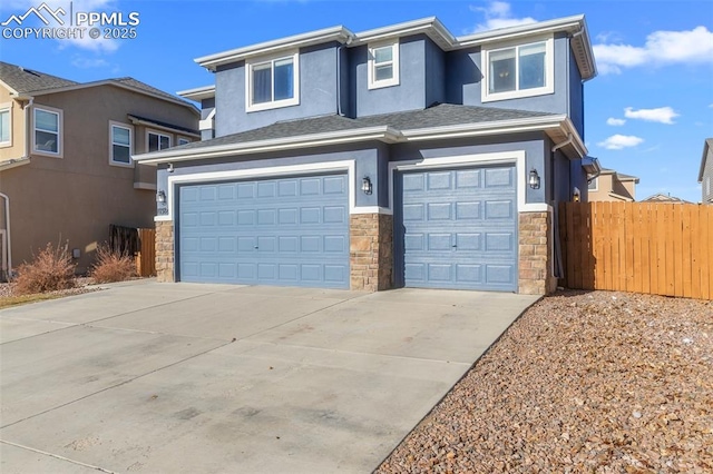 view of front of home with a garage