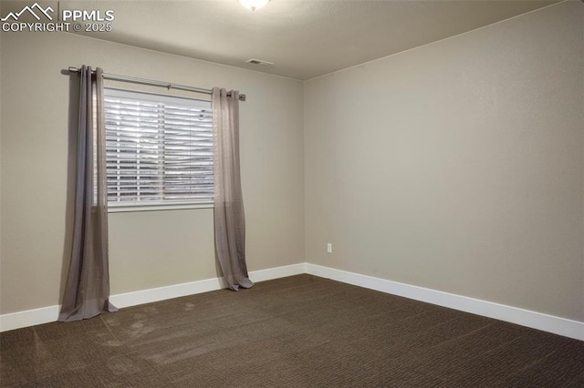 view of carpeted spare room