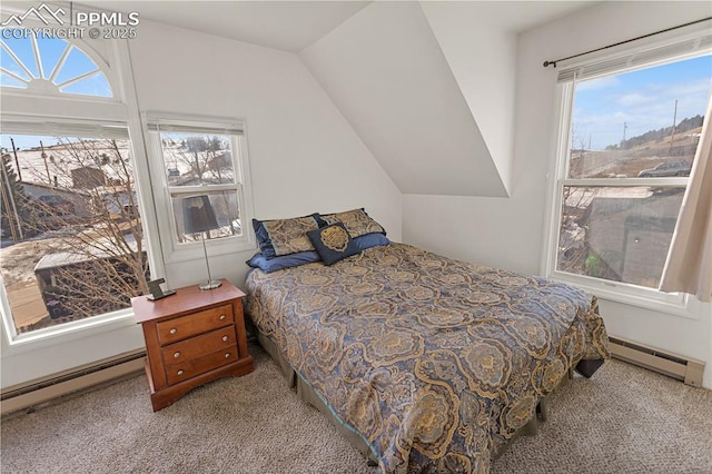 carpeted bedroom with lofted ceiling and a baseboard heating unit