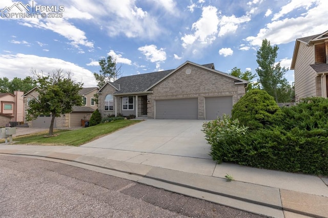 ranch-style home with a garage