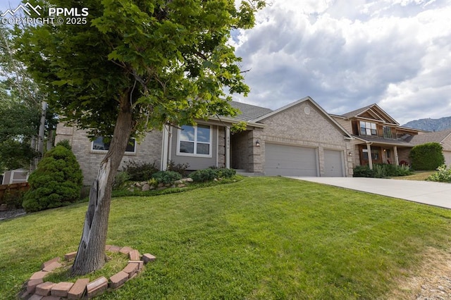 view of front facade with a front lawn and a garage