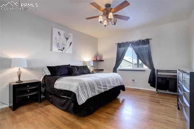 bedroom featuring ceiling fan and light wood-type flooring