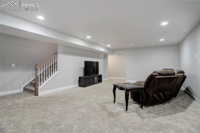 living room featuring light carpet