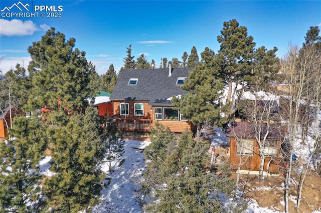 view of front of home featuring a wooden deck