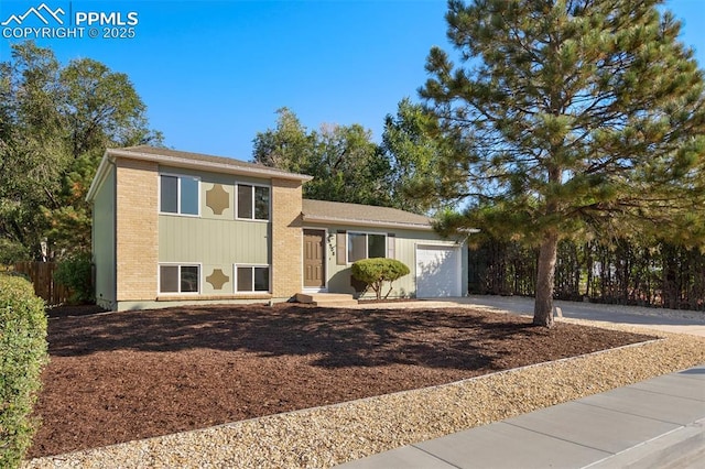 split level home with a garage