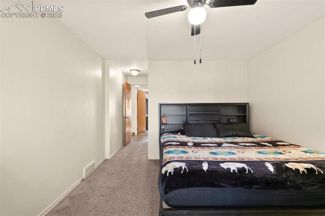 bedroom featuring ceiling fan and carpet floors