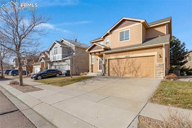 view of front of house with a garage and a front yard