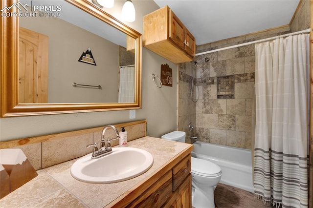 full bathroom featuring vanity, toilet, and shower / bathtub combination with curtain