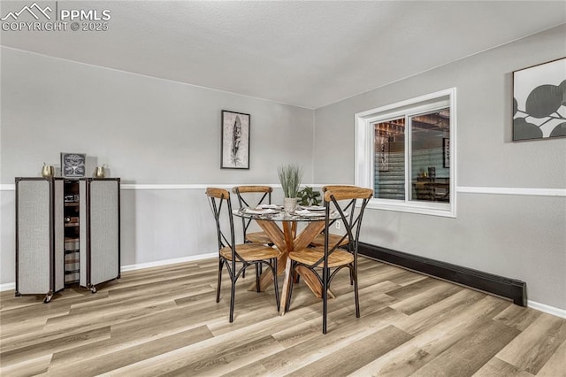 dining area featuring light hardwood / wood-style floors