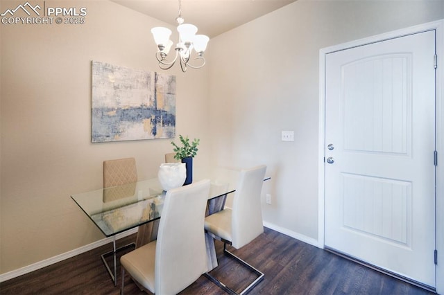 dining space with a notable chandelier and dark wood-type flooring