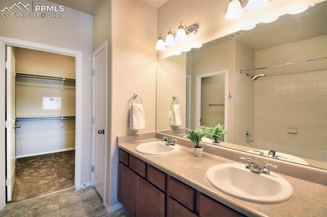 bathroom featuring vanity and bathtub / shower combination