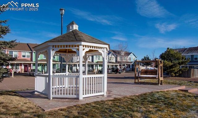 view of property's community featuring a gazebo and a yard