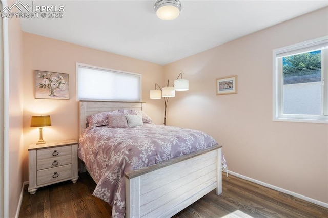 bedroom featuring dark hardwood / wood-style flooring