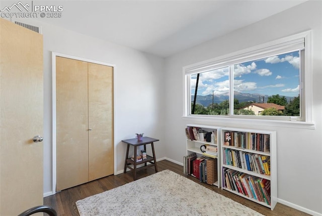 interior space with dark hardwood / wood-style floors