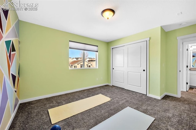 carpeted bedroom with a closet