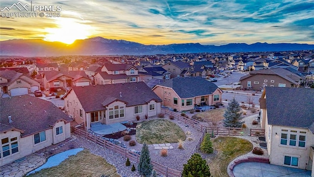 aerial view at dusk with a mountain view