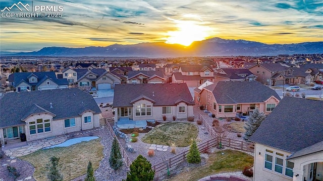 aerial view at dusk with a mountain view