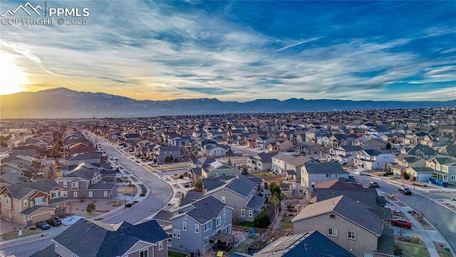 aerial view at dusk with a mountain view